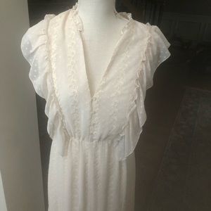Zara dress. 46 inches long. Very pretty. It is new. Never worn. Cotton and polye